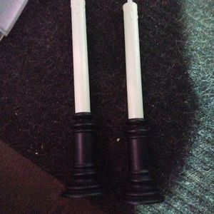 Two white my luminara candles. Battery operated